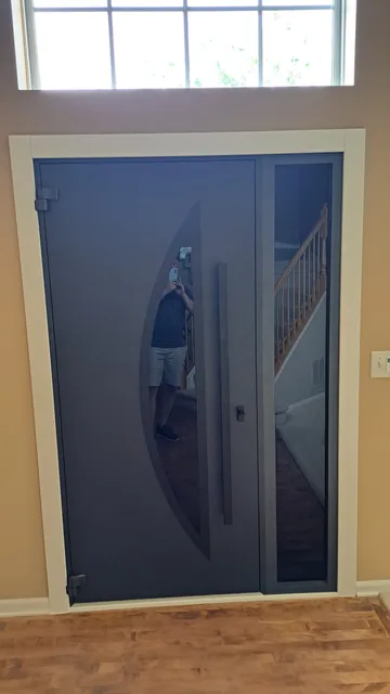 Interior view of a curved-glass entry door