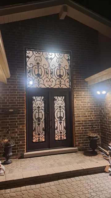 Decorative glass double doors and transom