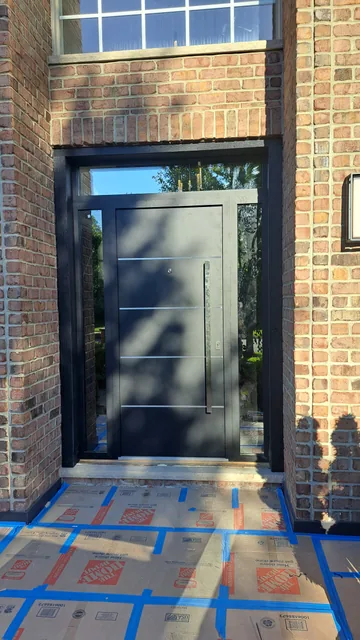 Modern entry door with sidelight and transom