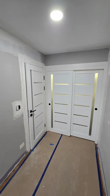 White entry door with horizontal glass